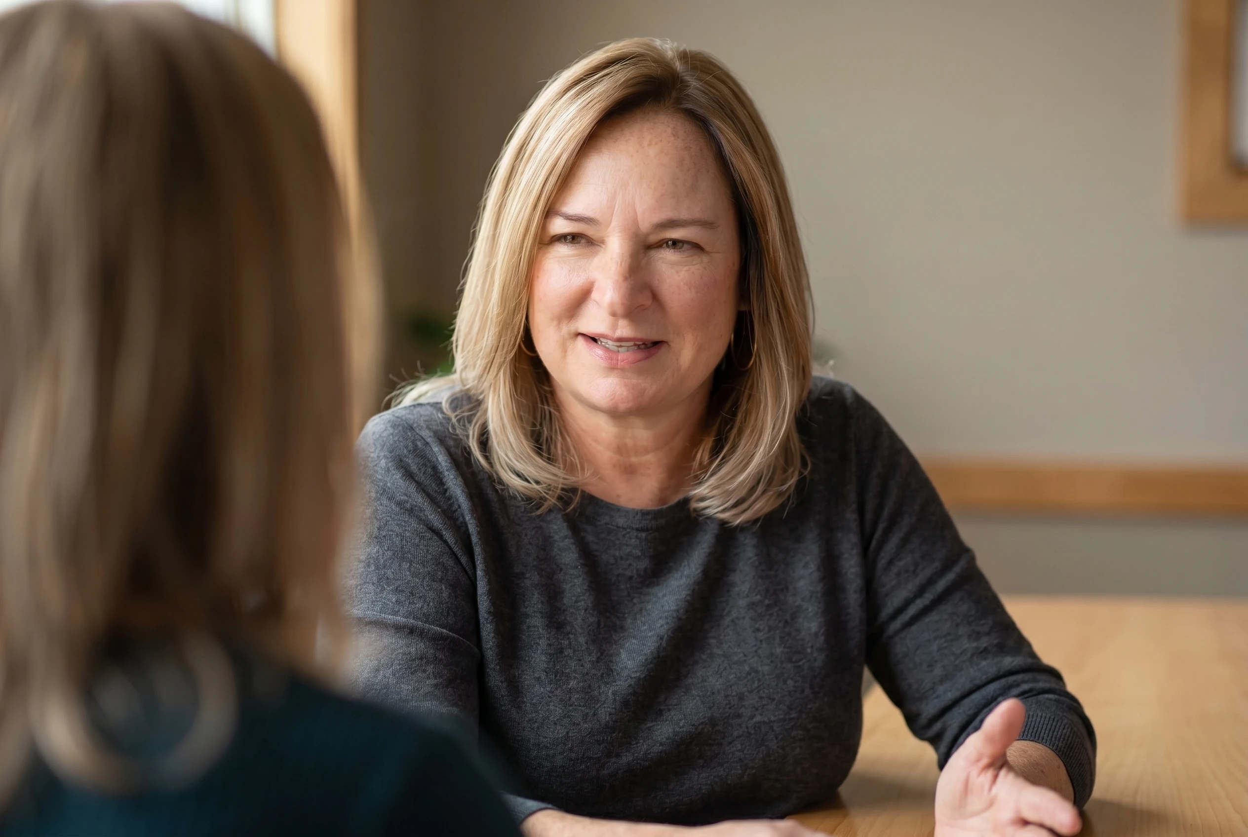 Shannan Hamilton explaining financial analysis to a client